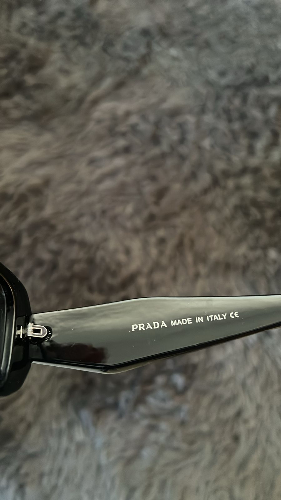 LENTES DE SOL PRADA
